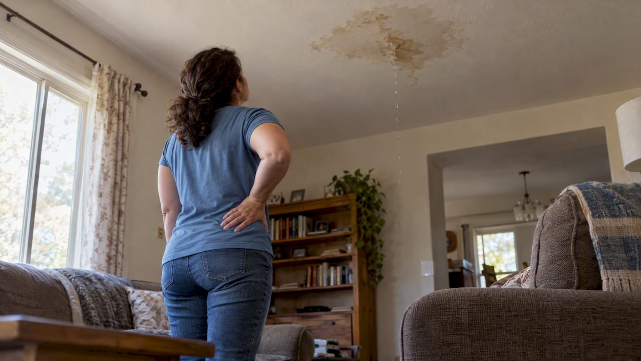 Homeowner spots water leaking through ceiling